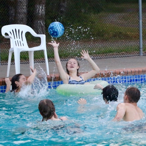 Students playing a game in the Kursa pool.